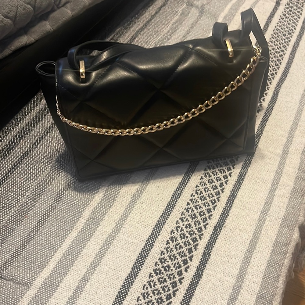 Soft quilted black purse, never used